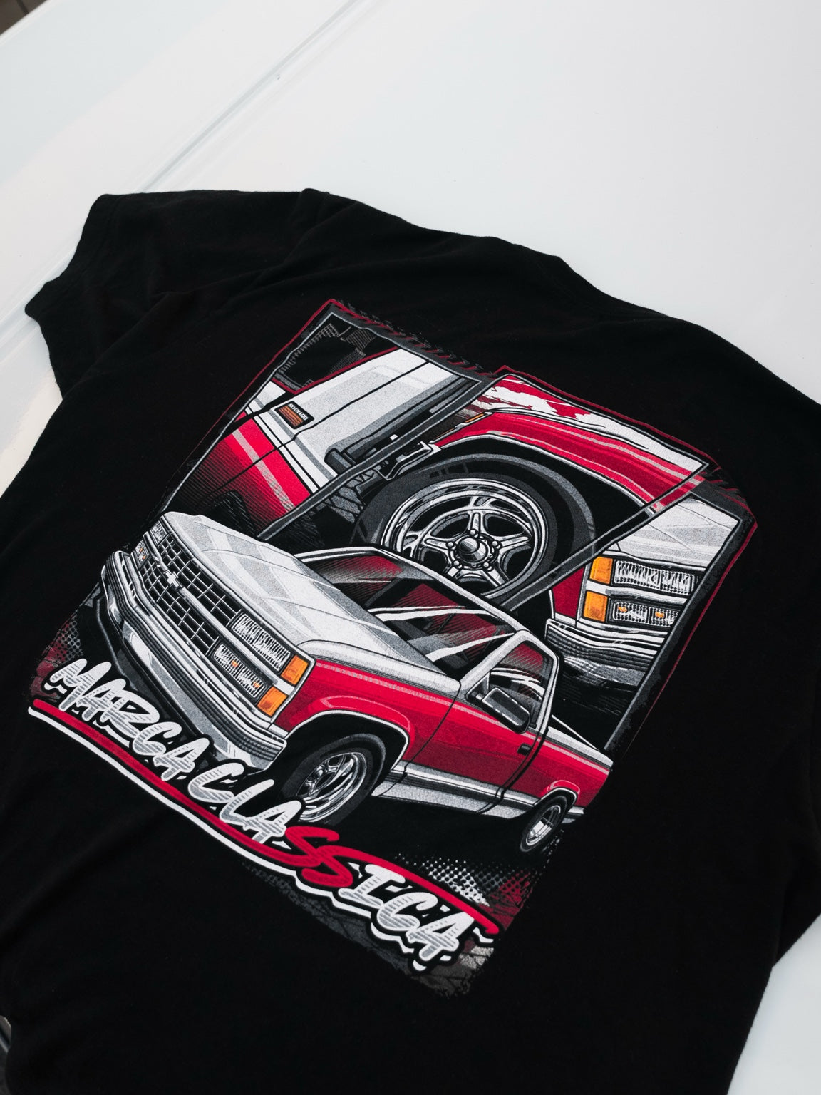 Close-up of OBS shirt back truck illustration from second angle