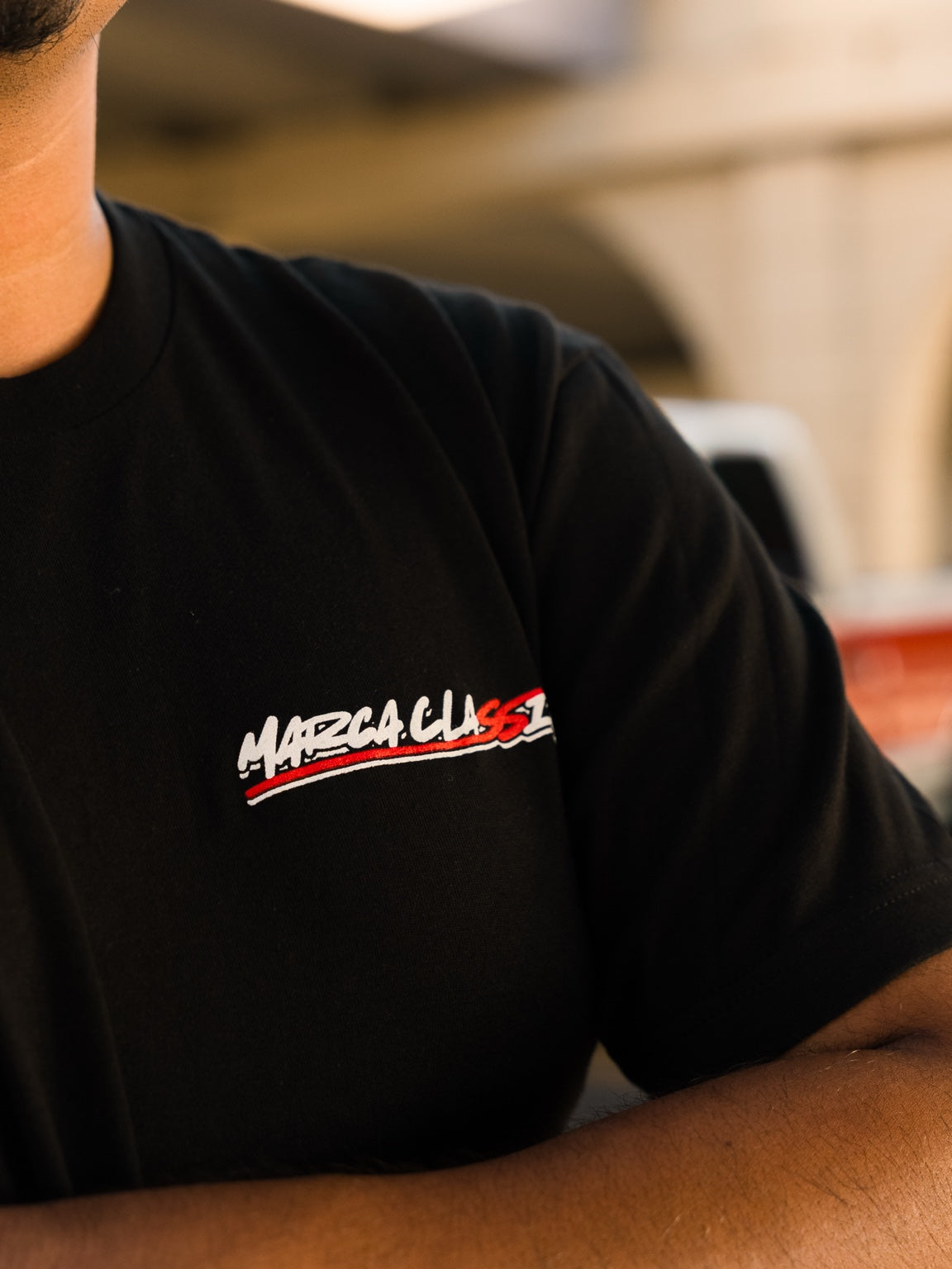 Marca Classica OBS shirt front chest logo worn close-up